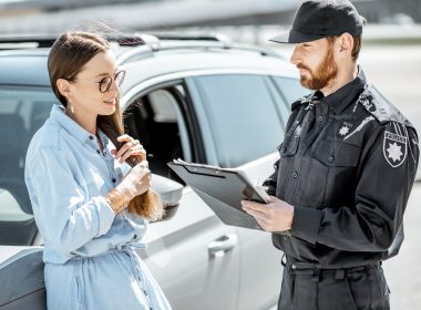 Woman pulled over by the police.
