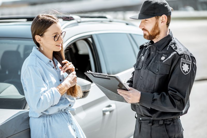 Woman pulled over by the police.