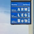 A humorous gas station sign for rising gas prices.