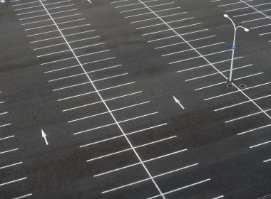 An empty warehouse parking lot common with the supply chain backlog currently being experienced.