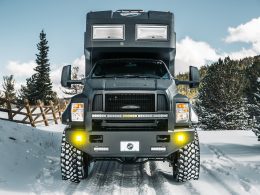 EarthRoamer XV in mountainous terrain traversing through the snow.