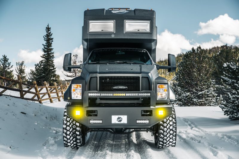 EarthRoamer XV in mountainous terrain traversing through the snow.