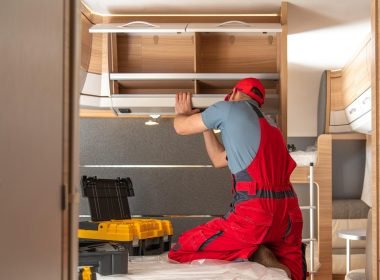 A serviceman builds a new RV interior