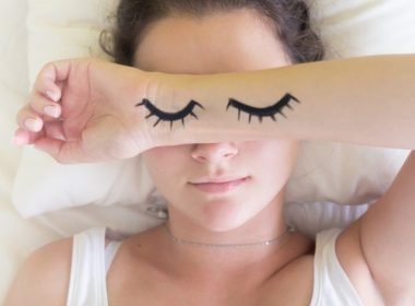cropped-painted-sleeping-eye-of-cute-young-woman-in-the-bed_t20_Op7axg.jpg