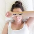 Painted sleeping eye of Cute young woman in the bed