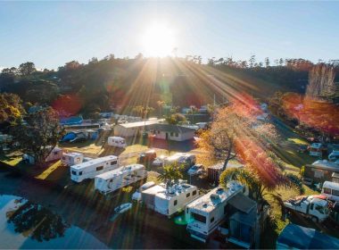 Aerial view of a sunny RV park.