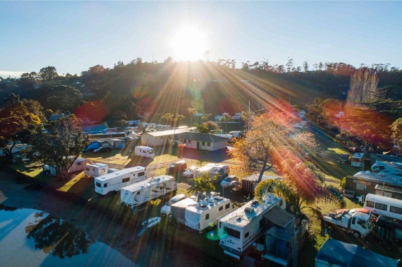 Aerial view of a sunny RV park.