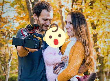 A family of three vlogs with their baby.