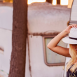Woman in front of micro campers