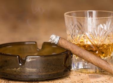 Cigarette ashtray and vintage whiskey