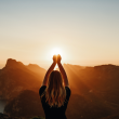 Woman meditating in spirutal environment