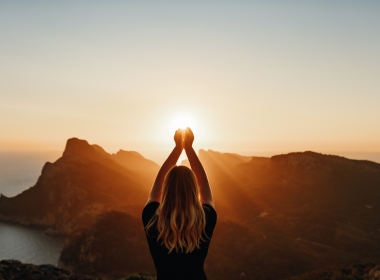 Woman meditating in spirutal environment