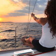 Woman sailing with pile of mail