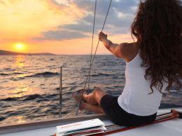 Woman sailing with pile of mail