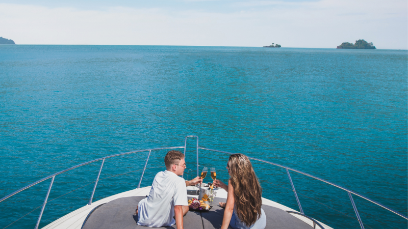 Couple sailing on a trimaran