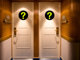 Cruise ship cabin doors with two question marks over each one.