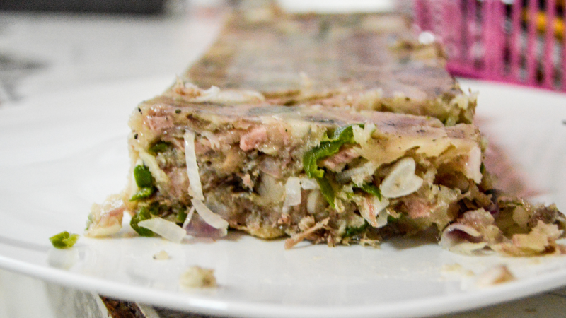 Hog Head Cheese on a white plate.