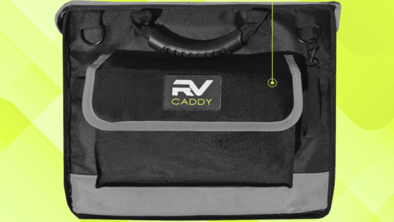 A photo of the RV Caddy by Trailersphere with a yellow background matching the Nomad News colors.