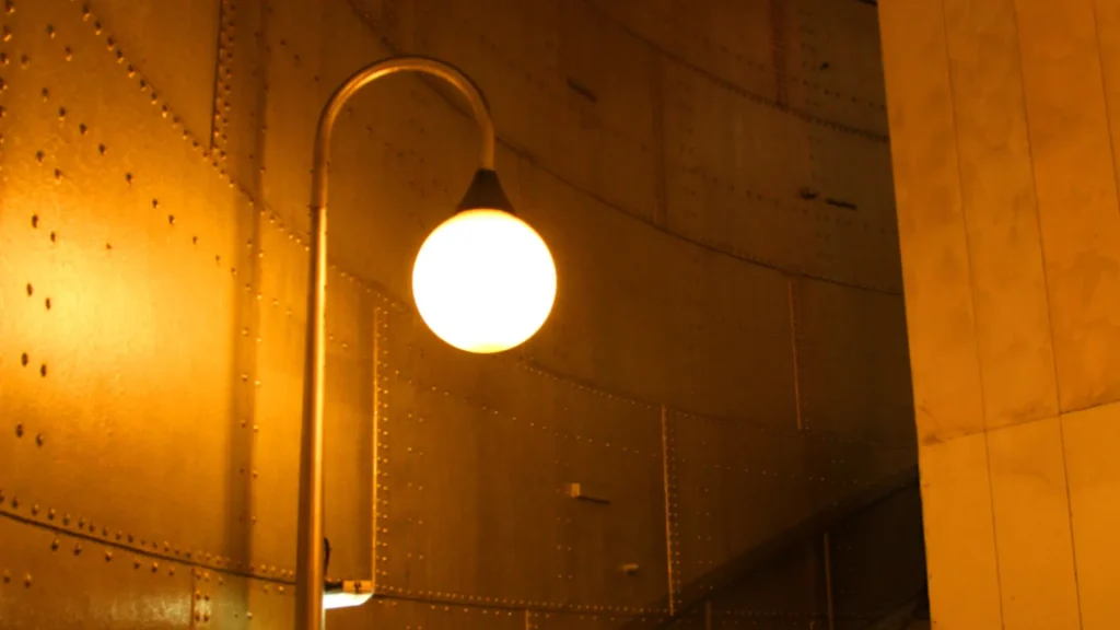 A dimly lit stairwell, emphasizes the perril that may occur when the stairewell isn't well lit.
